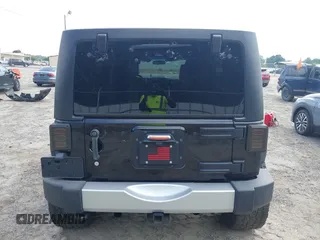 2012 Jeep Wrangler Unlimited Sahara with VIN 1C4HJWEG0CL168300, listed as a IAAI auction lot 42430678 with 70,000 mi miles and . Bid and sale history available at DreamBid. Image 17.