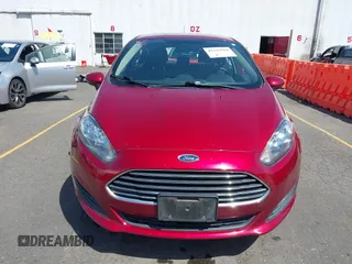 2017 Ford Fiesta SE z VIN 3FADP4EJ4HM168566, wystawiony jako IAAI lot #42223504 z przebiegiem 53 572 mil mil oraz . Historia ofert i sprzedaży dostępna na DreamBid. Obrazek 12.