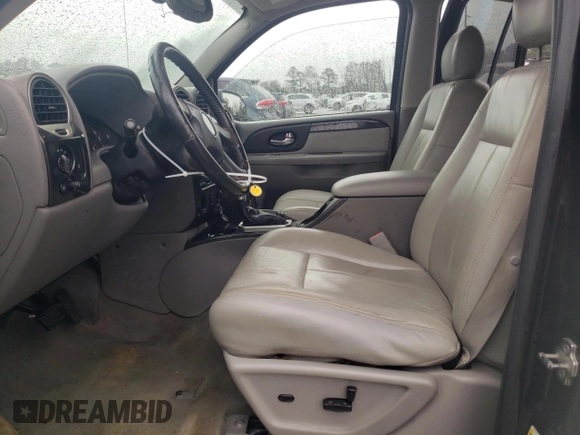 2008 GMC Envoy SLE2 with VIN 1GKDS13S682122400, listed as a Copart auction lot 45149485 with 143,182 mi miles and Salvage Title. Bid and sale history available at carsss.com. Image 7.