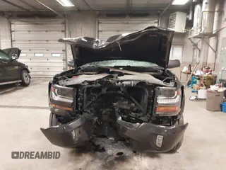 2016 Chevrolet Silverado 1500 LT with VIN 3GCUKRECXGG216804, listed as a IAAI auction lot 41825811 with 127,217 mi miles and . Bid and sale history available at DreamBid. Image 12.