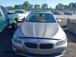2013 BMW 5 Series 528i with VIN WBAXG5C51DD233122, listed as a IAAI auction lot 42161809 with 70,242 mi miles and . Bid and sale history available at DreamBid. Image 6.