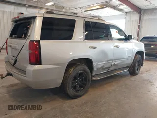 2016 Chevrolet Tahoe LTZ with VIN 1GNSKCKCXGR477284, listed as a IAAI auction lot 42221589 with Not provided miles and . Bid and sale history available at DreamBid. Image 4.