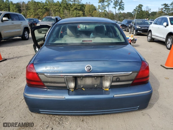 2011 Mercury Grand Marquis LS with VIN 2MEBM7FVXBX608636, listed as a Copart auction lot 82684944 with 157,843 mi miles and Salvage Title. Bid and sale history available at carsss.com. Image 6.