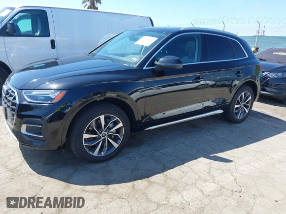 2021 Audi Q5 Premium Plus z VIN WA1BAAFY7M2114476, wystawiony jako IAAI lot #42063790 z przebiegiem 44 945 mil mil oraz . Historia ofert i sprzedaży dostępna na DreamBid. Obrazek 14.
