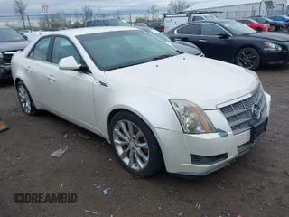 2008 Cadillac CTS RWD w/1SA with VIN 1G6DF577480195468, listed as a IAAI auction lot 41949156 with 121,636 mi miles. Bid and sale history available at carsss.com. Image 1.