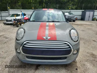 2015 MINI Hardtop 4 Door with VIN WMWXS5C5XFT831555, listed as a Copart auction lot 61673485 with 104,120 mi miles and Salvage title. Bid and sale history available at DreamBid. Image 5.