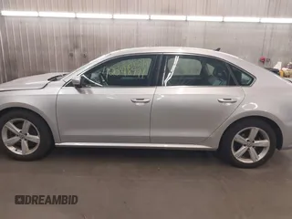 2013 Volkswagen Passat SE with VIN 1VWBH7A39DC145297, listed as a IAAI auction lot 42048991 with 146,897 mi miles and . Bid and sale history available at DreamBid. Image 15.