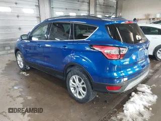 2018 Ford Escape SE z VIN 1FMCU9GD1JUB80500, wystawiony jako IAAI lot #41613294 z przebiegiem 112 187 mil mil oraz . Historia ofert i sprzedaży dostępna na DreamBid. Obrazek 3.