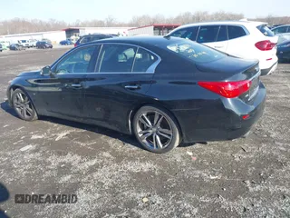 2015 Infiniti Q50 Premium z VIN JN1BV7AR9FM416956, wystawiony jako IAAI lot #41149753 z przebiegiem 81 888 mil mil oraz . Historia ofert i sprzedaży dostępna na DreamBid. Obrazek 14.