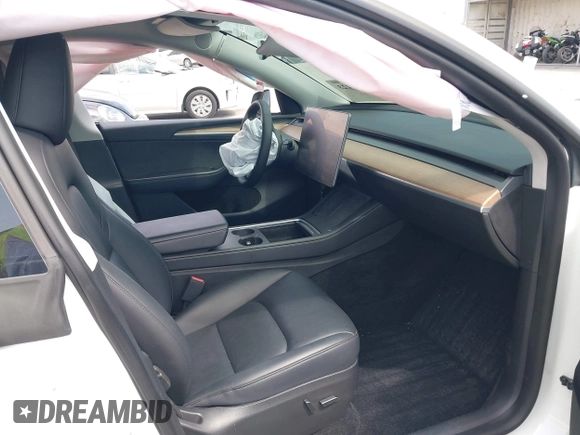 2023 Tesla Model Y Long Range with VIN 7SAYGDEE9PA026005, listed as a IAAI auction lot 41895223 with 43,813 mi miles and . Bid and sale history available at DreamBid. Image 5.