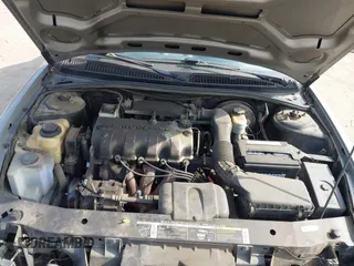 1999 Saturn SL z VIN 1G8ZH5280XZ249494, wystawiony jako IAAI lot #42347493 z przebiegiem 106 491 mil mil oraz . Historia ofert i sprzedaży dostępna na DreamBid. Obrazek 10.