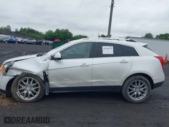 2013 Cadillac SRX Performance Collection with VIN 3GYFNHE34DS628486, listed as a IAAI auction lot 42530124 with 76,778 mi miles and . Bid and sale history available at DreamBid. Image 14.