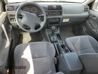 2001 Honda Passport LX z VIN 4S6CK58W414405269, wystawiony jako Copart lot #55362765 z przebiegiem 158 166 mil mil oraz Szkody całkowita. Historia ofert i sprzedaży dostępna na DreamBid. Obrazek 8.