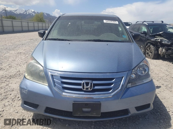 2009 Honda Odyssey LX z VIN 5FNRL382X9B028151, wystawiony jako Copart lot #54528305 z przebiegiem Nie podano mil oraz Czysty tytuł • Clean title. Historia ofert i sprzedaży dostępna na DreamBid. Obrazek 5.
