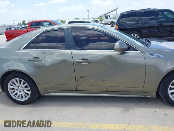 2010 Cadillac CTS Luxury with VIN 1G6DG5EG6A0148433, listed as a IAAI auction lot 42686517 with 106,701 mi miles and . Bid and sale history available at DreamBid. Image 13.
