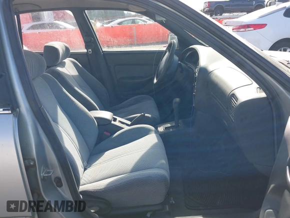 1994 Toyota Camry LE z VIN JT2SK12E0R0209312, wystawiony jako IAAI lot #42197159 z przebiegiem 270 657 mil mil oraz . Historia ofert i sprzedaży dostępna na DreamBid. Obrazek 5.