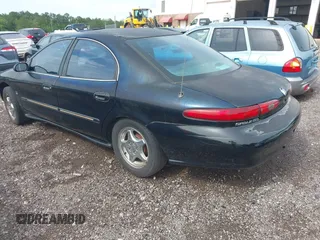 1999 Mercury Sable LS Premium Group z VIN 1MEFM53S7XA632876, wystawiony jako IAAI lot #42303137 z przebiegiem 178 617 mil mil oraz . Historia ofert i sprzedaży dostępna na DreamBid. Obrazek 3.