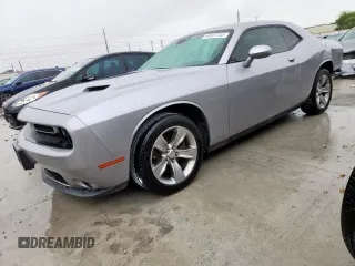 2016 Dodge Challenger SXT with VIN 2C3CDZAG1GH301159, listed as a Copart auction lot 64007155 with 98,398 mi miles and Salvage title. Bid and sale history available at DreamBid. Image 1.