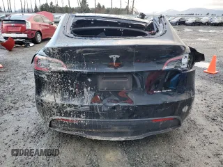 2023 Tesla Model Y Long Range with VIN 7SAYGAEE0PF832185, listed as a Copart auction lot 85159764 with Not Provided miles and Salvage Title. Bid and sale history available at DreamBid. Image 6.