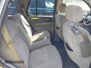 2003 GMC Envoy SLT z VIN 1GKDS13S932106295, wystawiony jako IAAI lot #41594814 z przebiegiem 199 597 mil mil oraz . Historia ofert i sprzedaży dostępna na DreamBid. Obrazek 8.
