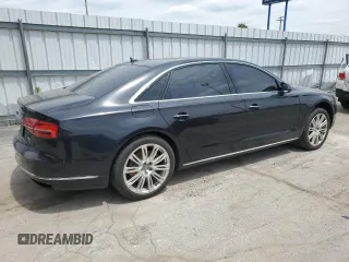 2015 Audi A8 4.0T z VIN WAU32AFD8FN001493, wystawiony jako Copart lot #57394315 z przebiegiem 120 464 mil mil oraz Szkoda całkowita • Salvage title. Historia ofert i sprzedaży dostępna na DreamBid. Obrazek 3.