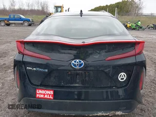 2021 Toyota Prius LE with VIN JTDKAMFP2M3165859, listed as a IAAI auction lot 41943098 with 20,306 mi miles and . Bid and sale history available at DreamBid. Image 17.