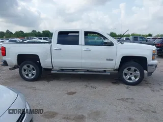 2014 Chevrolet Silverado 1500 LT with VIN 3GCPCREC1EG446044, listed as a IAAI auction lot 42044614 with 145,590 mi miles and . Bid and sale history available at DreamBid. Image 13.