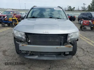 2014 Jeep Compass Latitude with VIN 1C4NJDEB4ED788348, listed as a Copart auction lot 52885935 with 86,282 mi miles and Salvage Title. Bid and sale history available at DreamBid. Image 5.