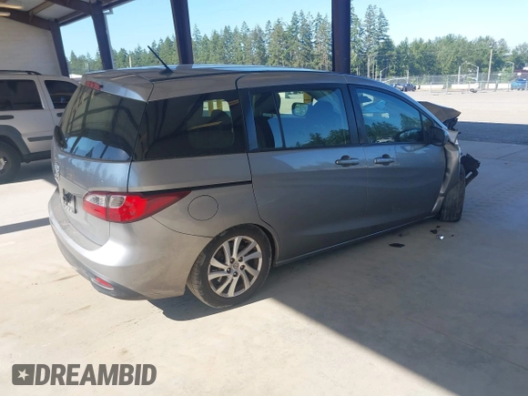 2012 Mazda 5 Sport with VIN JM1CW2BL3C0142202, listed as a IAAI auction lot 42397815 with Not provided miles and . Bid and sale history available at DreamBid. Image 4.