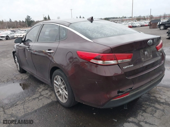 2016 Kia Optima EX with VIN 5XXGU4L31GG004714, listed as a IAAI auction lot 41183230 with 108,084 mi miles. Bid and sale history available at carsss.com. Image 3.