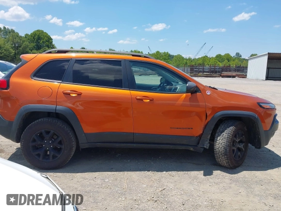 2016 Jeep Cherokee Trailhawk with VIN 1C4PJMBS6GW318035, listed as a IAAI auction lot 42652034 with 187,519 mi miles and . Bid and sale history available at DreamBid. Image 13.