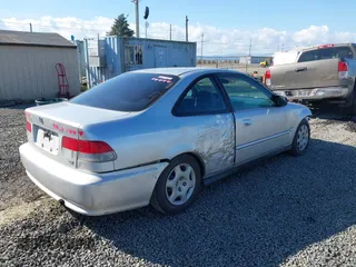 1999 Honda Civic EX with VIN 1HGEJ8242XL025414, listed as a IAAI auction lot 41736378 with 206,342 mi miles. Bid and sale history available at carsss.com. Image 4.