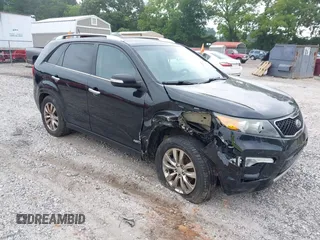2011 Kia Sorento SX with VIN 5XYKWDA20BG099415, listed as a IAAI auction lot 42411249 with 125,549 mi miles and . Bid and sale history available at DreamBid. Image 1.