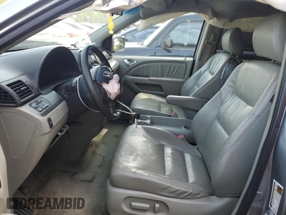 2007 Honda Odyssey EX-L with VIN 5FNRL38657B059033, listed as a Copart auction lot 54005495 with 212,674 mi miles and Salvage Title. Bid and sale history available at DreamBid. Image 7.