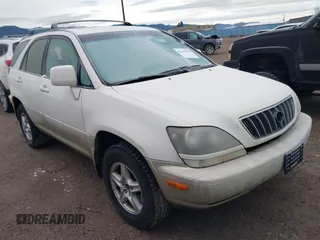 1999 Lexus RX 300 Luxury SUV with VIN JT6HF10U3X0033392, listed as a IAAI auction lot 41165188 with 233,343 mi miles. Bid and sale history available at carsss.com. Image 1.