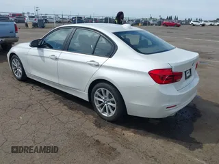 2016 BMW 3 Series 320i with VIN WBA8A9C52GK617133, listed as a IAAI auction lot 42029140 with 59,113 mi miles. Bid and sale history available at carsss.com. Image 3.
