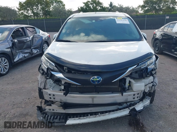 2021 Toyota Sienna XLE with VIN 5TDYRKEC7MS017968, listed as a IAAI auction lot 42145440 with 85,989 mi miles and . Bid and sale history available at DreamBid. Image 6.