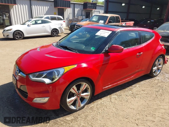 2012 Hyundai Veloster w/Gray Int z VIN KMHTC6AD0CU048339, wystawiony jako IAAI lot #42040008 z przebiegiem 117 895 mil mil oraz . Historia ofert i sprzedaży dostępna na DreamBid. Obrazek 2.