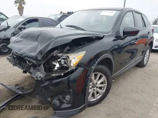 2014 Mazda CX-5 Touring z VIN JM3KE2CY3E0355332, wystawiony jako IAAI lot #42096306 z przebiegiem 108 198 mil mil oraz . Historia ofert i sprzedaży dostępna na DreamBid. Obrazek 2.