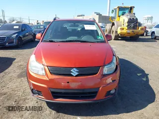 2009 Suzuki SX4 Man Touring Pkg AWD with VIN JS2YB417496201691, listed as a IAAI auction lot 41741746 with 172,369 mi miles. Bid and sale history available at carsss.com. Image 12.