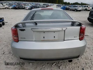 2004 Toyota Celica GT with VIN JTDDR32T040167769, listed as a Copart auction lot 71633564 with 168,797 mi miles and Clean Title. Bid and sale history available at carsss.com. Image 6.