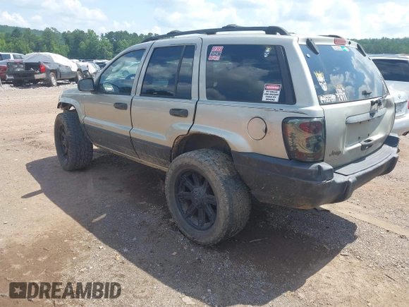 2004 Jeep Grand Cherokee Laredo with VIN 1J4GW48S34C354006, listed as a IAAI auction lot 42599812 with 258,004 mi miles and . Bid and sale history available at DreamBid. Image 3.