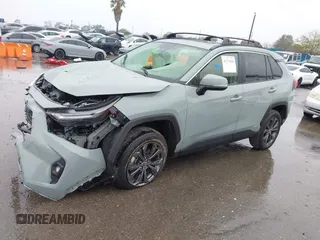 2023 Toyota RAV4 Hybrid XLE Premium with VIN JTMB6RFVXPD104349, listed as a IAAI auction lot 41730288 with 30,904 mi miles. Bid and sale history available at carsss.com. Image 2.