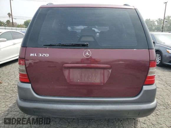 1999 Mercedes-Benz M 320/430/500 with VIN 4JGAB54E7XA099742, listed as a Copart auction lot 53672645 with 167,750 mi miles and Clean Title. Bid and sale history available at DreamBid. Image 6.