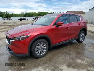 2023 Mazda CX-5 S Carbon Edition z VIN JM3KFBCM1P0139220, wystawiony jako Copart lot #52152365 z przebiegiem 13 704 mil mil oraz Nie do naprawy. Historia ofert i sprzedaży dostępna na DreamBid. Obrazek 1.