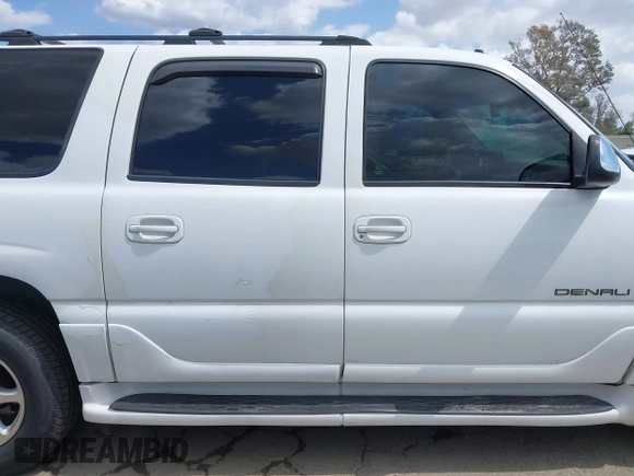 2003 GMC Yukon XL Denali with VIN 1GKFK66UX3J227538, listed as a IAAI auction lot 41915607 with 150,173 mi miles. Bid and sale history available at carsss.com. Image 13.