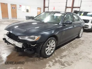 2016 Audi A6 2.0T Premium Plus with VIN WAUGFAFC4GN052293, listed as a IAAI auction lot 41683195 with 85,312 mi miles. Bid and sale history available at carsss.com. Image 2.