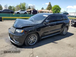 2018 Jeep Grand Cherokee Summit with VIN 1C4RJFJT6JC258846, listed as a Copart auction lot 57971185 with 114,587 mi miles and Salvage title. Bid and sale history available at DreamBid. Image 1.