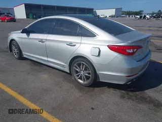 2015 Hyundai Sonata Sport with VIN 5NPE34AB0FH084580, listed as a IAAI auction lot 42150153 with 159,633 mi miles and . Bid and sale history available at carsss.com. Image 3.