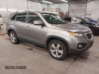 2012 Kia Sorento EX with VIN 5XYKUDA29CG209028, listed as a IAAI auction lot 42303476 with 205,886 mi miles and . Bid and sale history available at DreamBid. Image 1.
